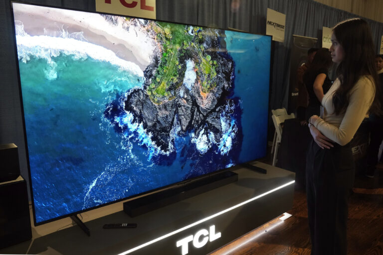 TV as Big as Bed? With Holidays Approaching, Stores Stock More Supersize Sets