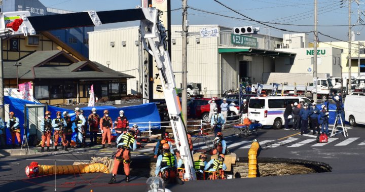 Rescue underway as pool-sized sinkhole swallows truck and driver in Japan – National
