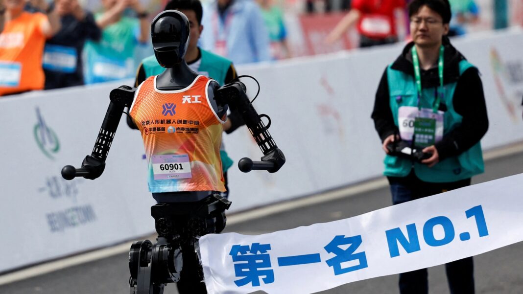 Bizarre history made as robots race humans in half-marathon for first time ever