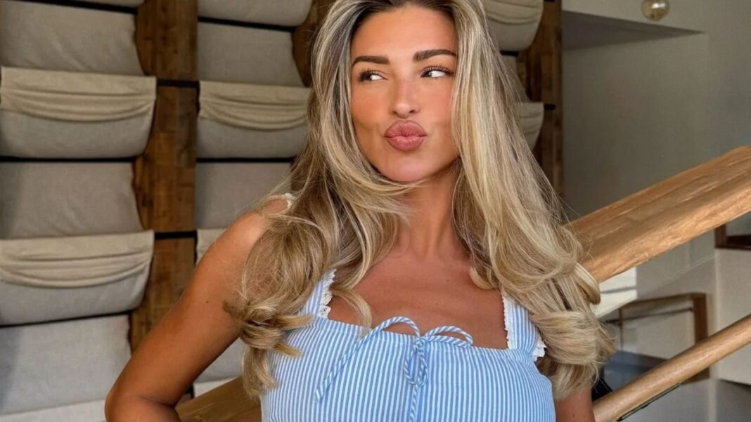 Zara McDermott shows off her tiny waist in a crop top as boyfriend Louis Tomlinson’s sisters swoon over her