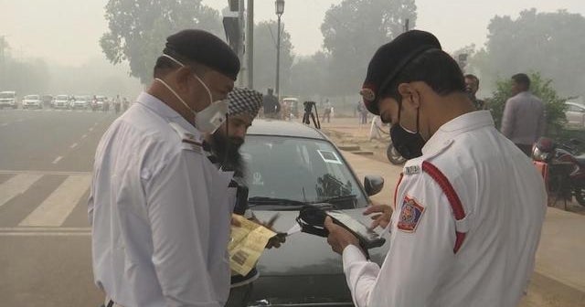 India’s capital closes schools, restricts cars amid pollution crisis