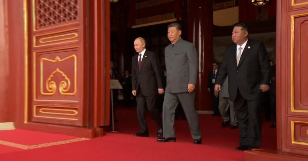 Russia’s Vladimir Putin and North Korea’s Kim Jong Un attend China’s massive military parade
