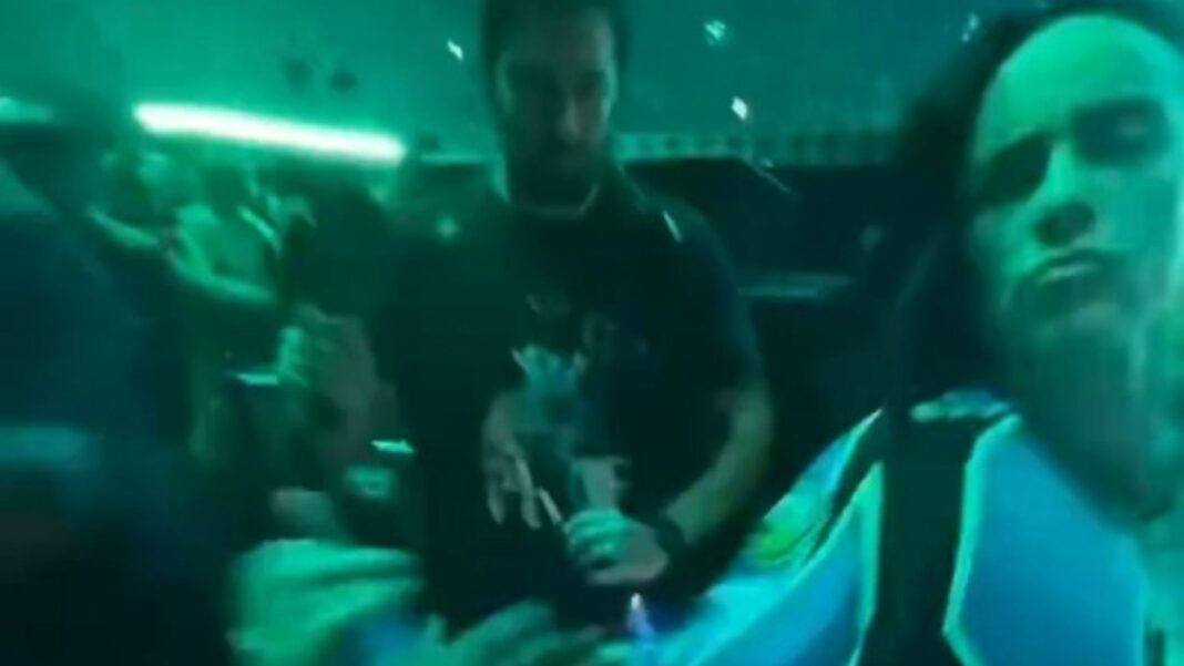 Shocking moment superstar Billie Eilish is violently pulled to the floor by fan in worrying concert video