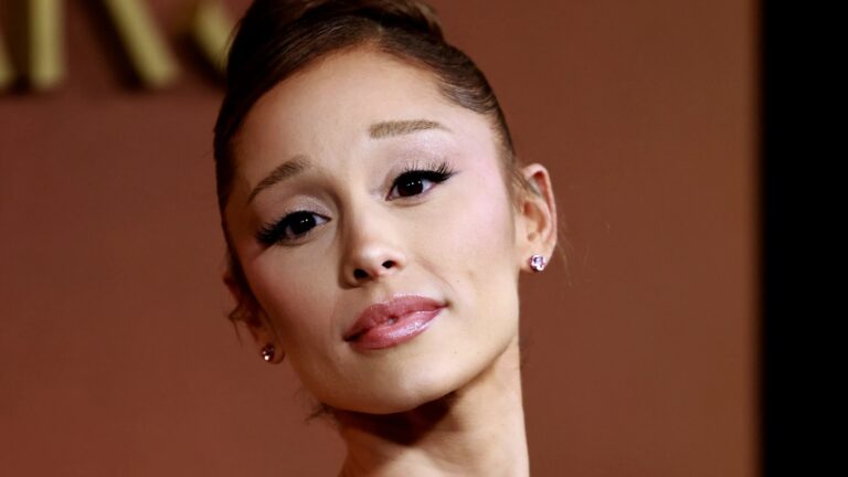 Prankster who lunged at singer Ariana Grande has been kicked out of Singapore and banned from returning