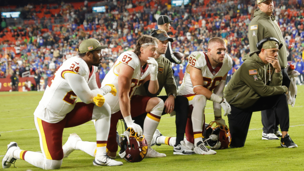 Jayden Daniels’ elbow injury is latest cruel knife twist in Commanders’ season gone awry