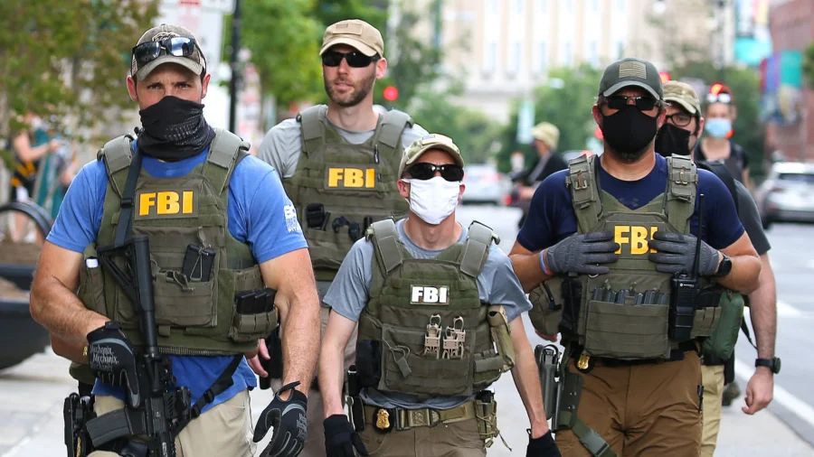 12 FBI Employees Fired for Kneeling at George Floyd Protest Sue to Get Their Jobs Back