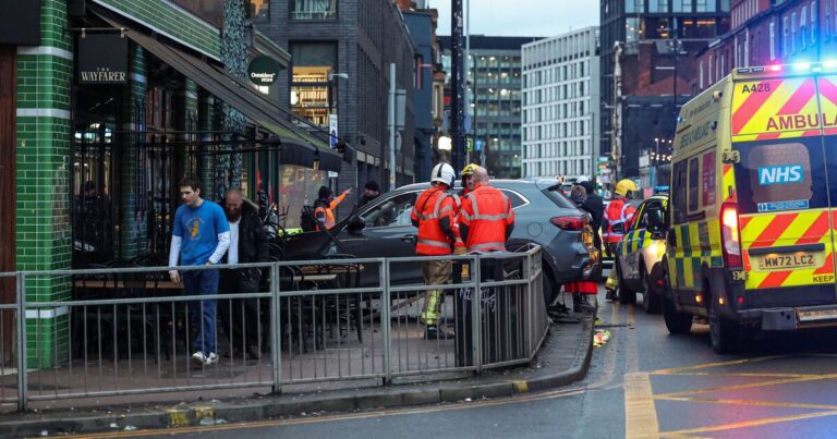 Manchester crash LIVE: Police rush to city centre after car nearly crashes into bar
