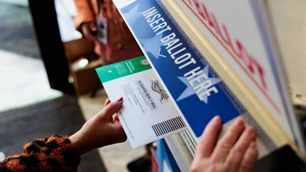 Trump signs executive order limiting mail-in voting